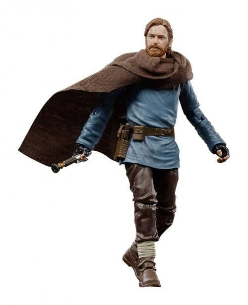 Action figure of a character with a brown cape and blue outfit on a white background