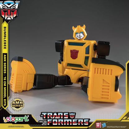 Transformers toy figure with AMK series branding on a dark background