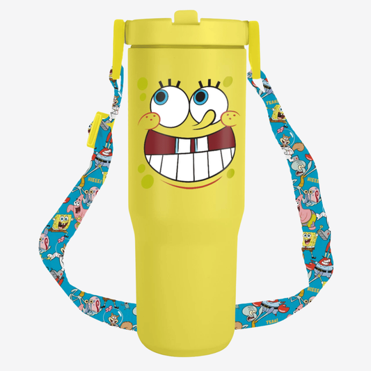 A yellow insulated tumbler with a matching yellow lid and a blue patterned shoulder strap featuring SpongeBob SquarePants characters, shown on a light gray background.