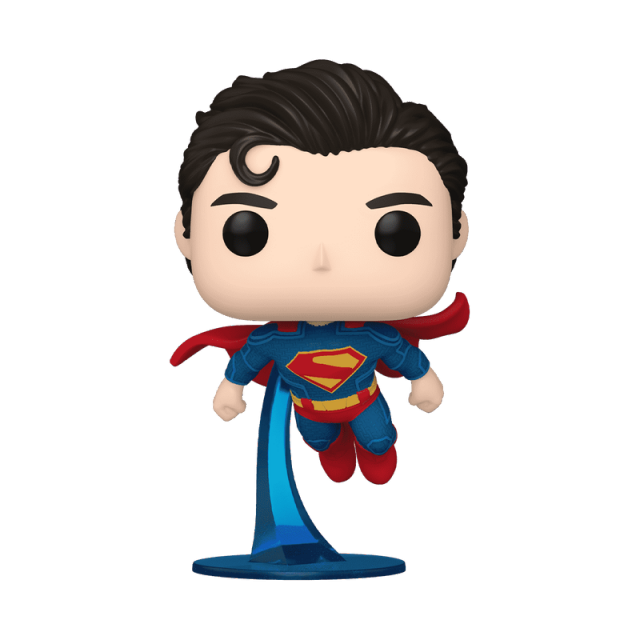Superman figurine with red cape and blue suit on a white background