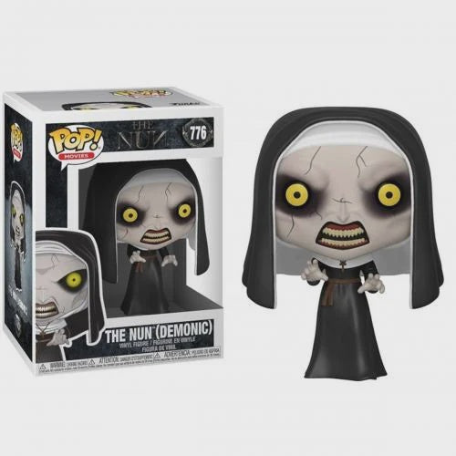 A Funko Pop vinyl figure of The Nun from the horror movie, displayed with its original packaging.