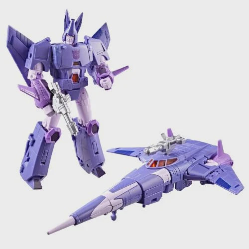 A purple and light purple toy robot figure standing next to its matching jet-shaped vehicle, shown on a plain light gray background.