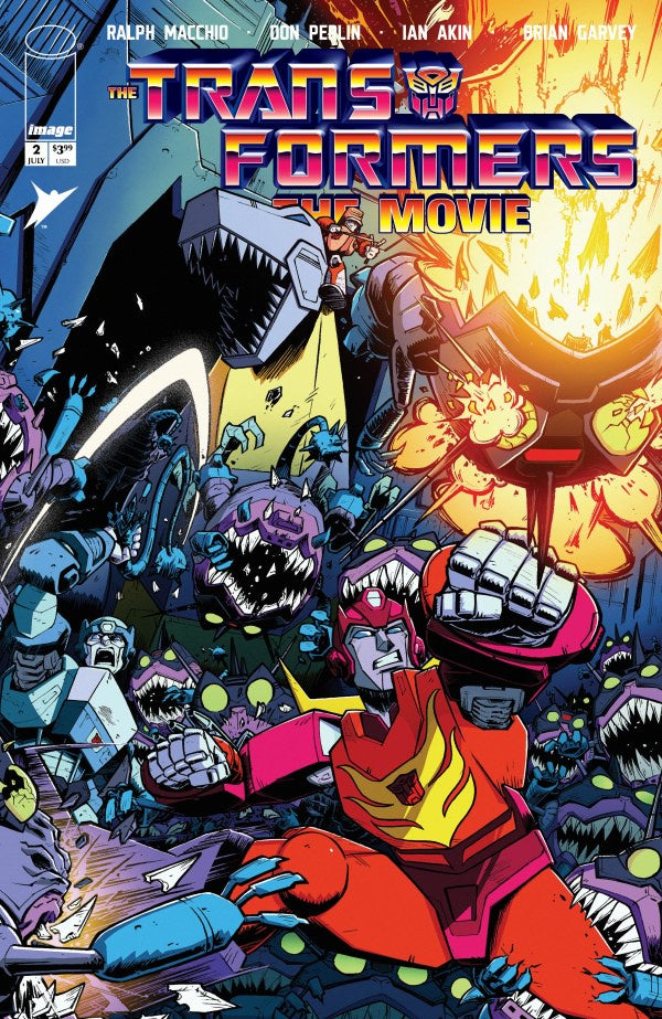 Comic book cover of 'The Transformers: The Movie' with various characters and action poses.