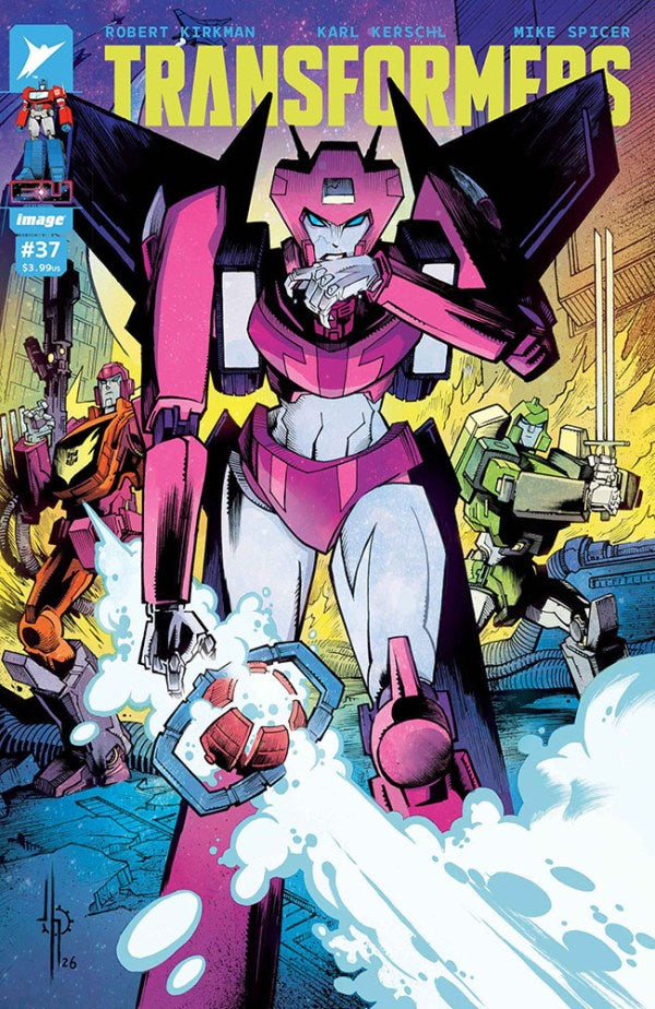 Transformers comic book cover featuring a large pink and white robot in the center, with other colorful robot characters around it and the Transformers title at the top.