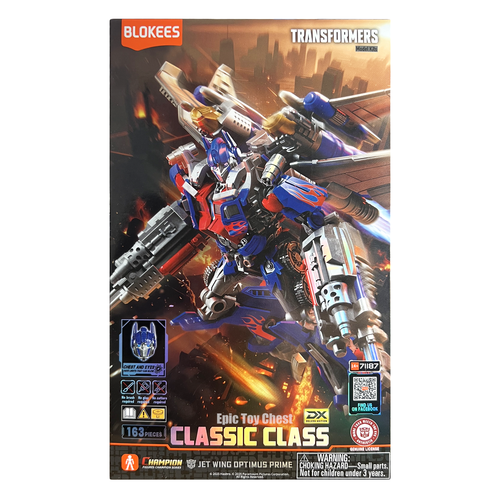 Transformers toy figure packaging with Optimus Prime on a white background