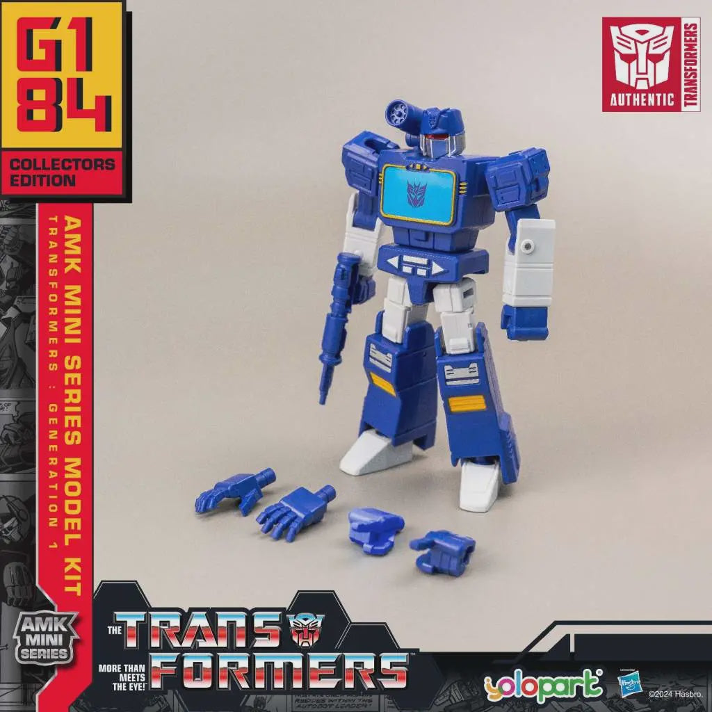 Transformers toy figure with parts on a beige background, featuring AMK Mini Series branding.