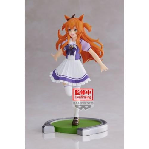 Anime character figurine with red hair and a purple dress on a gray background