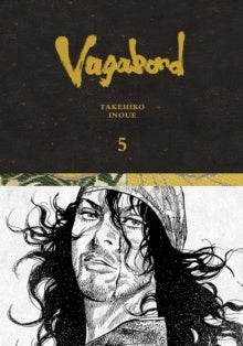 Manga book cover of 'Vagabond' with a character's face and the title in gold on a black background.