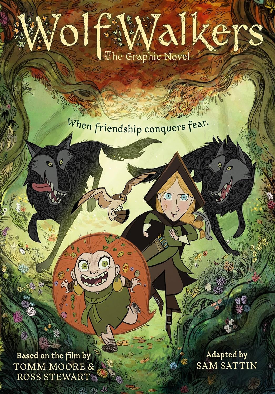 Cover of 'Wolfwalkers' graphic novel with two wolves and a girl in a forest setting.