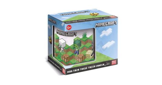 A ceramic mug with a Minecraft theme, featuring character figures from the game on the packaging.